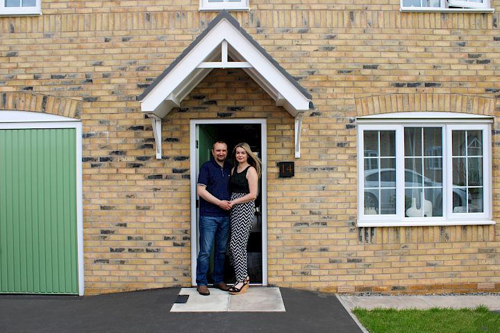 Couple at the front door