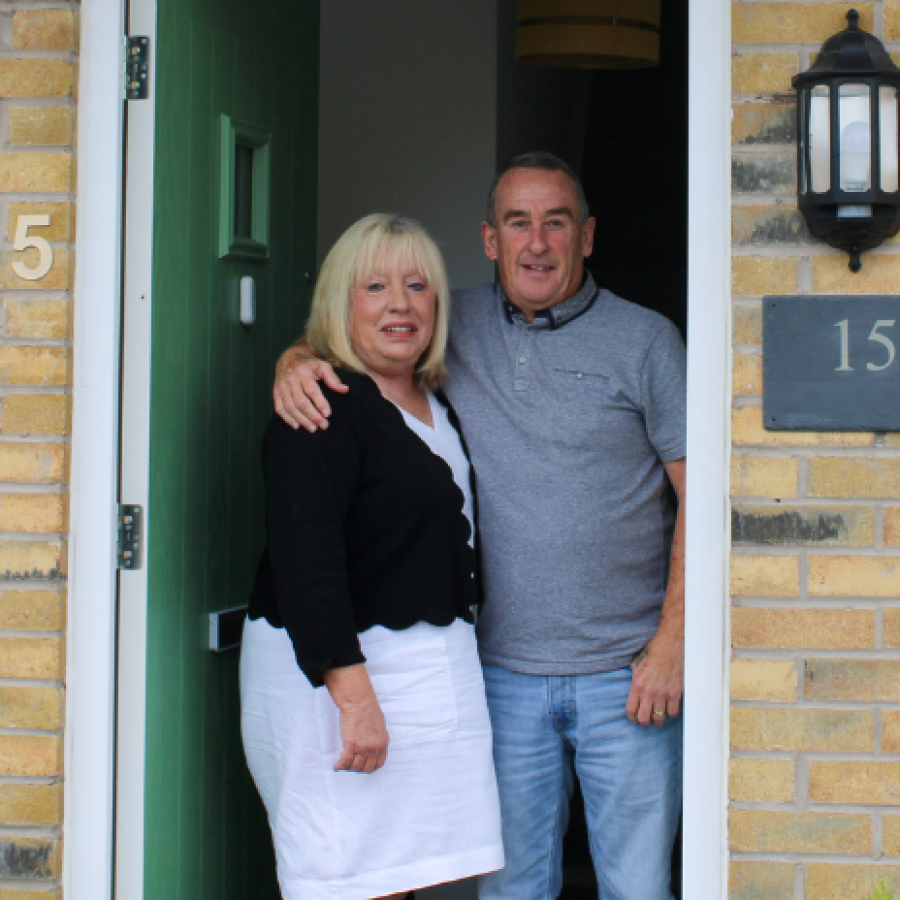 Couple stood at the front door