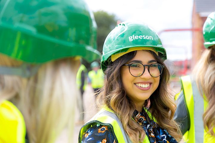 Woman in construction hat and PPE