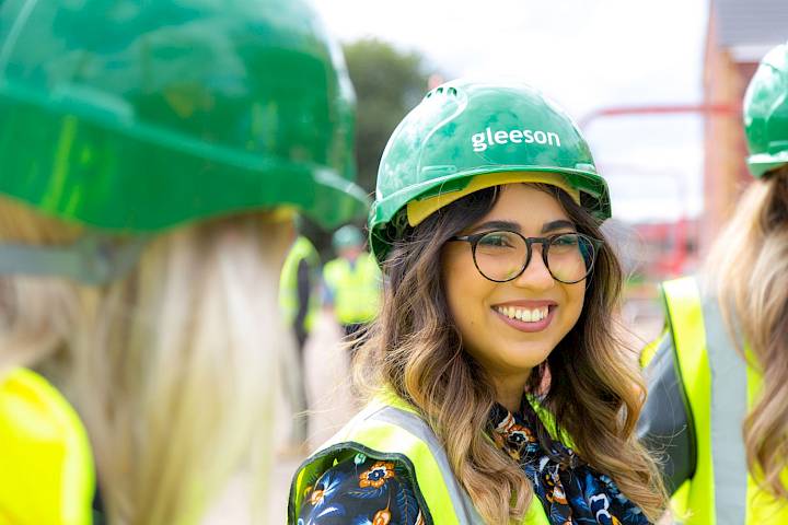 Woman in construction hat and PPE