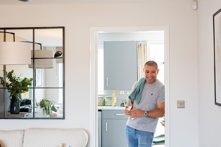 Male stood in a kitchen doorway